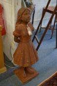 An unusual large cast iron figure of a young girl.
