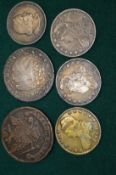 A group of American and other coins to include three early 19th century 50 cent pieces.