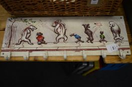 A novelty cast iron coat rack.