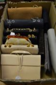 A collection of ladies handbags, evening bags.