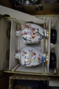 A pair of large Japanese cloisonne vases and stands, boxed.