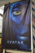 A large canvas cinema poster for the film Avatar.