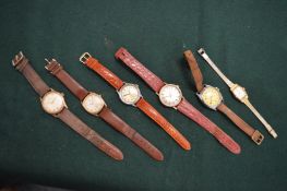 Two gentlemans 9ct gold wristwatches and various other watches.