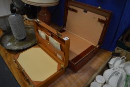 Two leather briefcases.