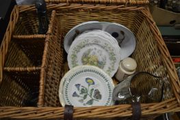 A wicker basket, decorative china, glassware etc.