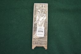 A Chinese cast metal plaque.