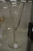 A large wine glass or vase, the bowl engraved with flowers and the word Fiat.