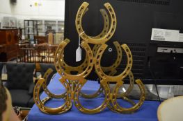 A horseshoe style wine rack.