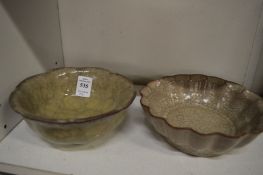 Two Chinese celadon crackle glaze bowls.
