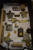A collection of brass and other door furniture.
