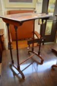 A 19th century rosewood occasional table with slender turned supports.