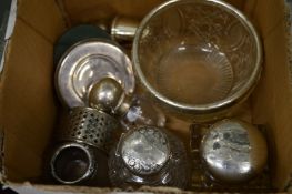 Silver topped cut glass jars and other items.
