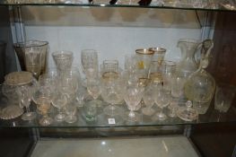 Various glassware to include a jug with matching carafe and tumblers.
