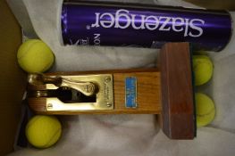 Tennis interest, the upper section of a tennis net tensioning post mounted on a plinth, possibly