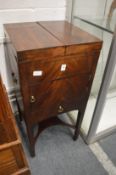 A George III mahogany washstand with bi-fold top, converted to a drinks cabinet.