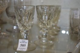 A set of six moulded glass liqueur glasses.