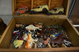 Box of die-cast toys and animals.