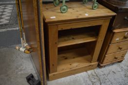 A small pine bookcase.