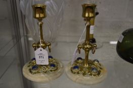 A good pair of Victorian brass alabaster and cabochon blue stone candlesticks.