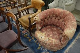 An Edwardian inlaid mahogany framed horseshoe shaped armchair and a Victorian button upholstered