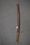 A Japanese NCO sword with signed blade and leather covered scabbard.