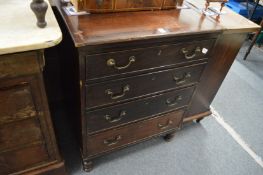 A small mahogany four drawer chest.