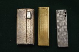 Three cigarette lighters.