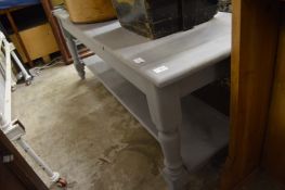 A grey painted two-tier coffee table.
