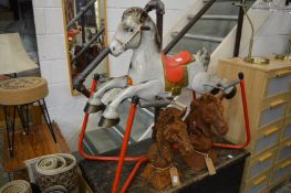 A Mobo Prairie King tin plate rocking horse.