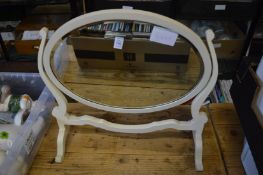 A white painted dressing table mirror.