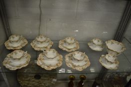 A set of eight Foley china porcelain cups and saucers of lobed shape together with a set of six