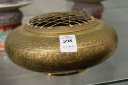 An Eastern engraved brass rose bowl and cover.