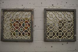 A pair of Moroccan style garden mirrors.