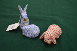 Two Herend porcelain rabbits.