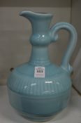A Chinese pale blue glazed ewer, marks to the base.