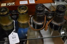 Two pairs of early binoculars or opera glasses.