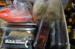 Decorative party wigs and a fur coat.