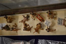 A cold painted cast metal dog band.