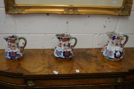 A graduated set of eight Masons ironstone imari decorated jugs together with two similar jugs (