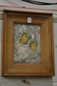 A framed and glazed icon.