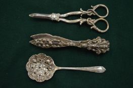 Grape scissors, sifter spoon and nut crackers.