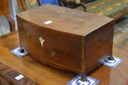 19th century mahogany bow fronted table top storage box with fitted interior.