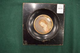 Portrait miniature of a young child.
