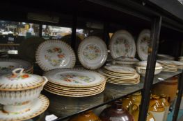 A large quantity of Royal Worcester dinner ware with floral decoration.