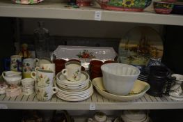 Shelf of decorative china.