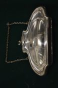 A silver plated evening purse.