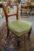 A set of six Victorian mahogany dining chairs.