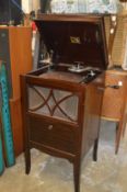 An HMV mahogany case floor standing gramaphone.