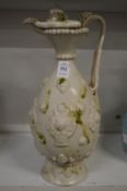 A Chinese pottery ewer and cover.