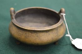 A Chinese bronze censer.